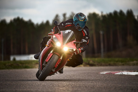 Madrid, Spain. 10-03-2022. Motorcyclist at sport bike riding by road