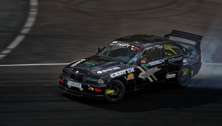 21-05-2022 Riga, Latvia car drifting on asphalt racing track with lot of smoke, motion blur drift car..のeditorial素材