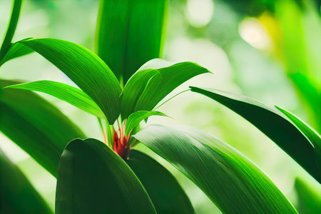 a close up of a green plant with red flowers on it's leaves and a blurry background. .