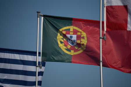 Large portuguese flag waving in the wind