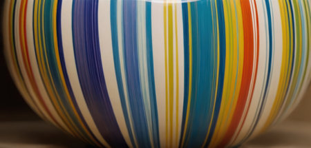 Colorful ceramic bowl. Abstract background for design. Close-up.の素材