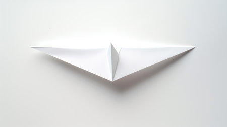 Paper origami airplane isolated on white background. 3d illustration.の素材