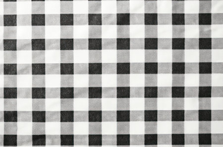 Checkered black and white fabric background. Texture of cloth.の素材