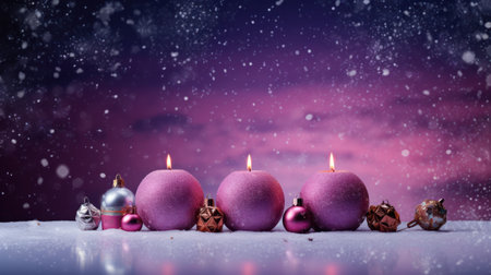 Christmas candles with pink baubles and snowfall on purple backgroundの素材