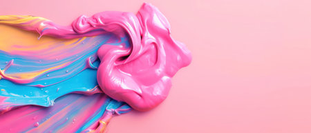 Pink and blue paint on a pink background. Abstract background for design.の素材