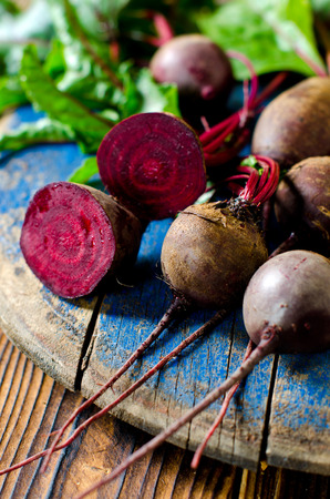 Fresh beets on a wooden tableの写真素材