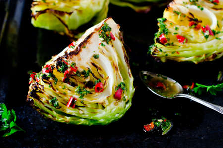 Baked young cabbage with spicy sauceの写真素材