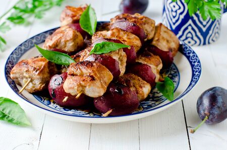 Chicken, turkey kebabs with plumsの写真素材