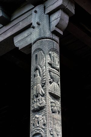 Protestant Johannes church in Berlin Frohnau Germany with carving details of the entranceの写真素材