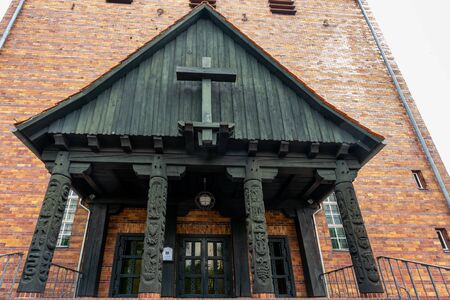 Protestant Johannes church in Berlin Frohnau Germany with carving details of the entranceの写真素材