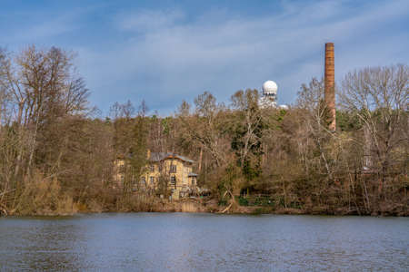 Teufelssee, Berlin, Germany - march 18, 2020: the Teufelssee lake and hill with the Oekowerk on a sunny spring dayのeditorial素材