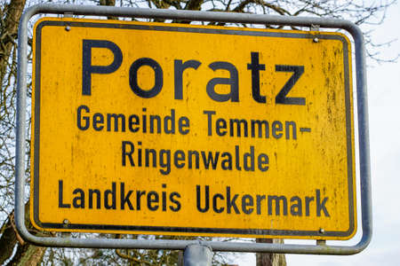 Poratz, Brandenburg, Germany - march 11, 2018: yellow town sign of the Brandenburg hamlet Poratzのeditorial素材
