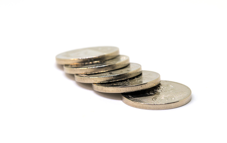 Silver metallic coins. Cash money closeup photo. Currency background. Business success and profit concept. Salary or loan in cash. Corruption and cash payment. Company budget. Small coin changeの写真素材