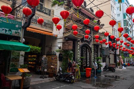 Ho Chi Minh, Vietnam - 30 Jul 2019: chinese temple and red paper lantern decor on street....