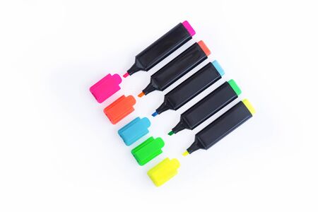 Five Colorful Markers On A White Background, Top View. Arranged in a straight line with Open Caps. Sketchpens. Highlighters. Pens. Felt Tip. Isolated.の写真素材