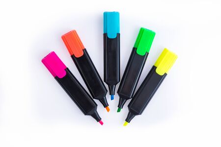 Five Colorful Markers On A White Background, Top View. Arranged in a semi-circle with Open Caps. Sketch pens. Highlighters. Isolated.の写真素材