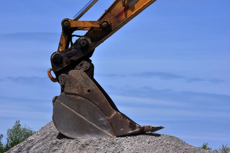 Excavator Shovel and Road Gravelの写真素材