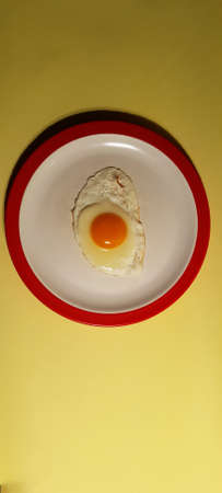 Egg Fried with Yellow Backgroundの写真素材