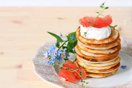 stack of pancakes on a ceramic plateの写真素材