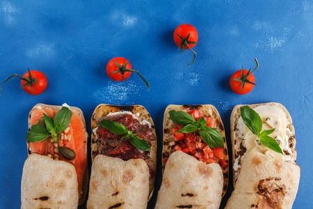 panini sandwich on blue background. top viewの写真素材