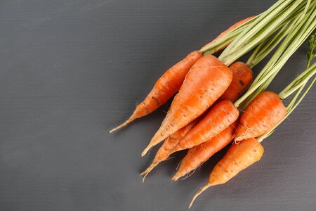 Fresh carrots on grey backgroundの写真素材