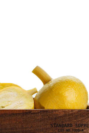 yellow pumpkins in box