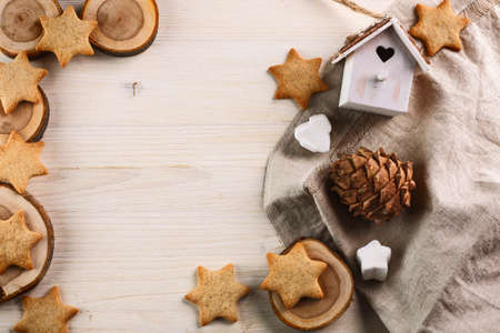christmas decoration. ginger cookies and marshmallow on a wooden tableの写真素材
