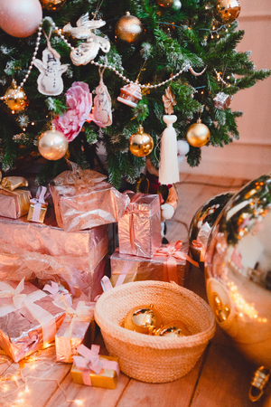 gifts pink under the Christmas tree.の写真素材