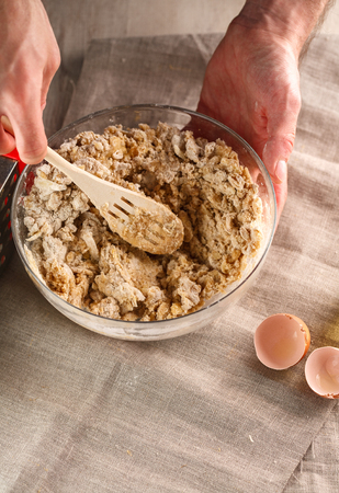 preparation of dough for flat bread. dough kneading for flat pancakesの写真素材