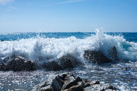 Wave crashing against a rock. Lloret de Mar. Spainの写真素材