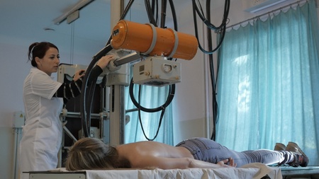 doctor in the office at the table. doctor in a very old hospital in the officeの写真素材