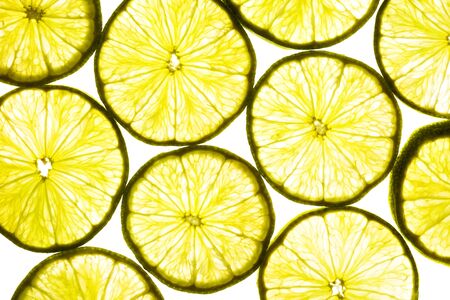 Pattern of lemon slices isolated on white