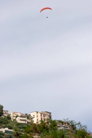 paraglinder up in the skyの写真素材