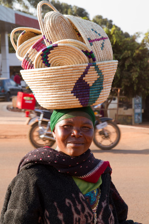 zanzibar market place woman with things to sellのeditorial素材