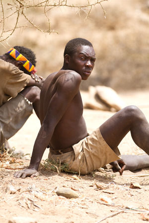 hadzabe man portrait in his village in tanzaniaのeditorial素材