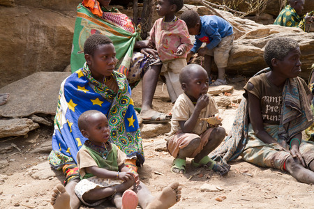 hadzabe peopole sitting together, only 1000 people are left of this tribeのeditorial素材