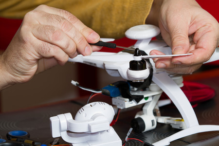 electrician fitting a quadcopterの写真素材