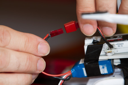 electrician fitting a quadcopter