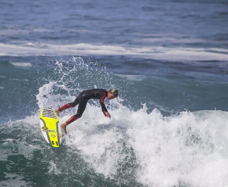 Surfer on top of waveのeditorial素材