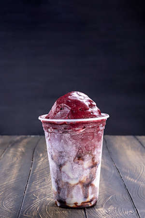 Ice Cream acai Cup on table woodenの写真素材