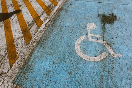 Sign Disabled Person Wheelchair on Street Parking Airport floorの写真素材
