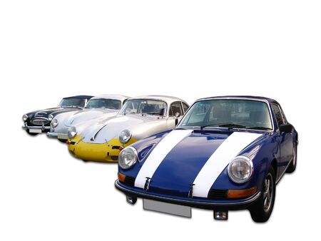 Old vintage cars isolated in white
