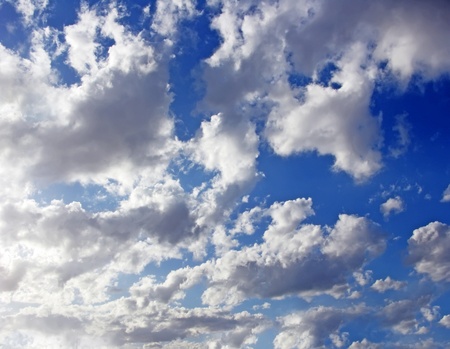 White and cottony clouds in the skyの写真素材