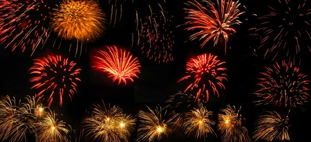 Colorful fireworks over dark sky, displayed during Barcelona Patron Saint La Merce (24th of september)の写真素材