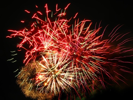 Colorful fireworks over dark sky, displayed during Barcelona Patron Saint La Merce (24th of september)の写真素材