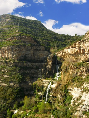 Waterfall in the mountain, placed in Sant Miquel del Fai (Barcelona, Spain)の写真素材