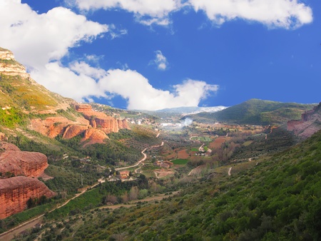 Valley placed on a little town called Sant Miquel del Fai in Barcelona (Spain), green trees with a...