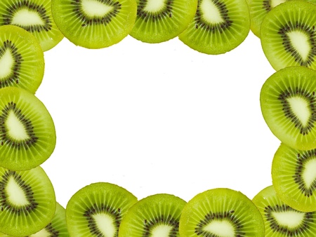 Green kiwi fruits frame over white backgroundの写真素材