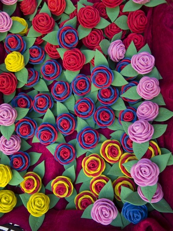 Homemade rubber roses in different colorsの写真素材