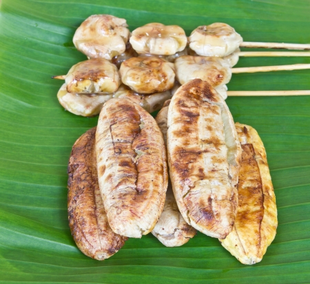 The roasted banana on the banana leafの写真素材